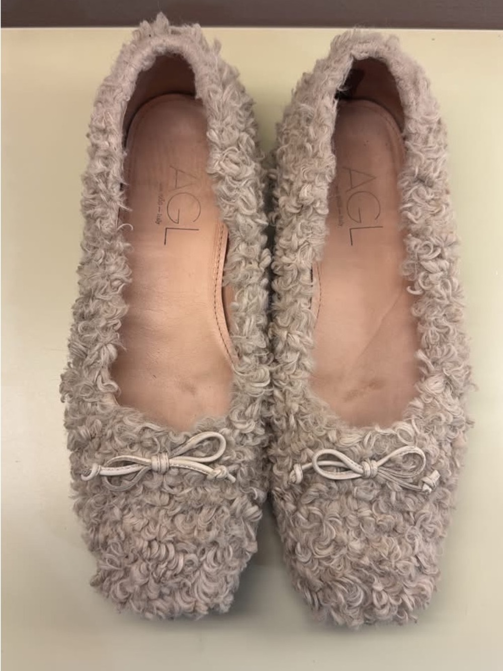 AGL Cream Curly Shearling Ballet Flats with Bow